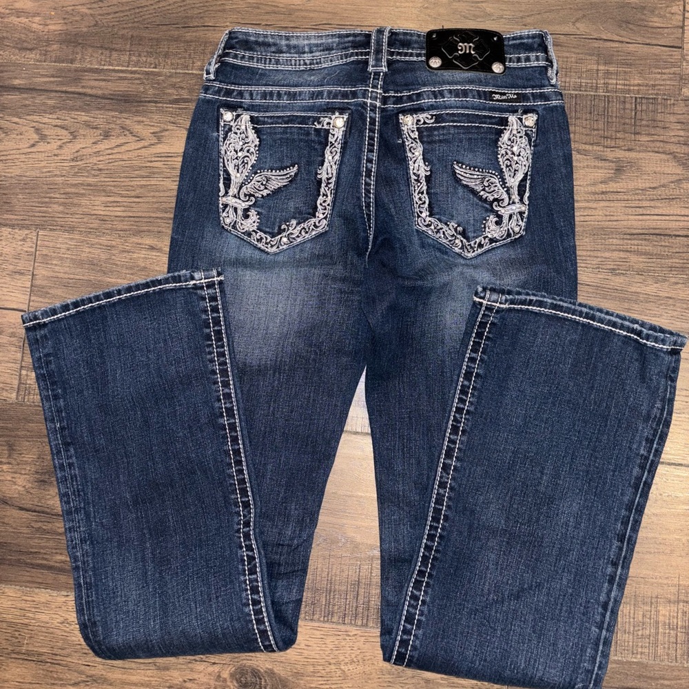 Miss Me Jeans Size 29 Boot Cut With Rhinestone Detail on Pockets.